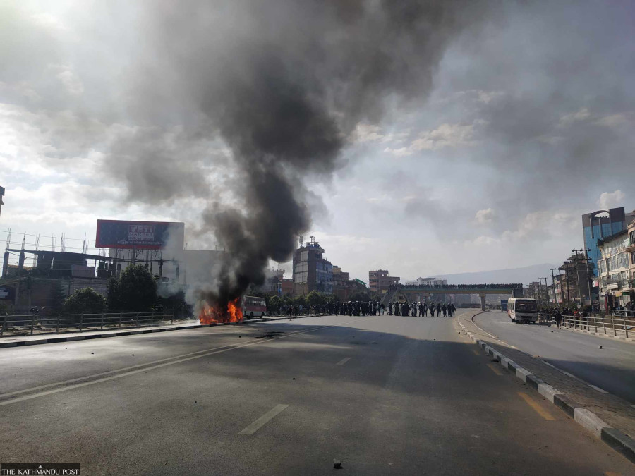 Protesters set minister’s vehicle on fire