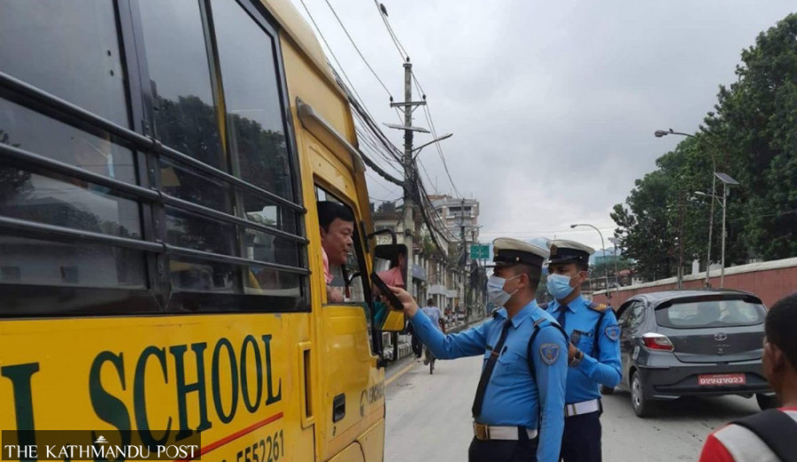 Dozen school bus drivers booked for rules violation