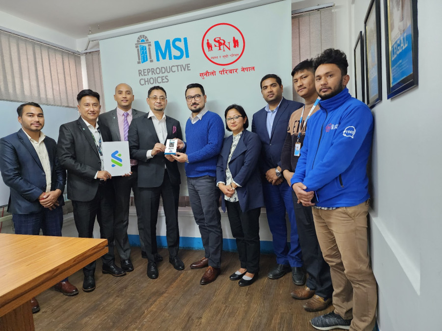 Standard Chartered Bank Nepal hands over first Nepalpay QR code to IDP Education and Sunaulo Parivar Nepal