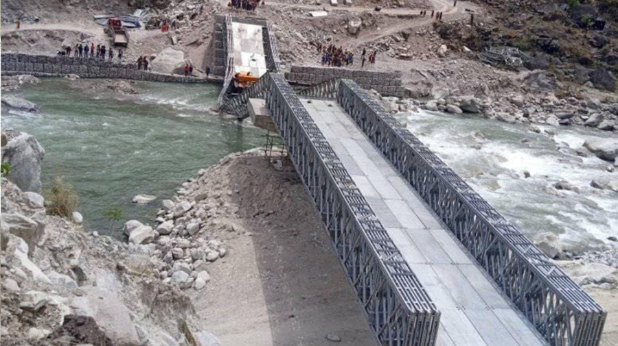 Two dead, three missing in bridge collapse