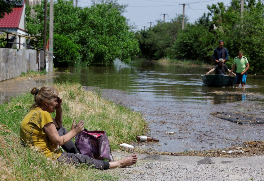 Ukraine says five killed, 13 missing in flooding since dam destroyed