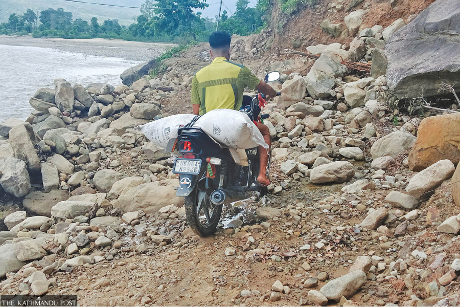 Flooded seasonal streams sever lifeline road, isolating Kanchanpur settlements from essential services