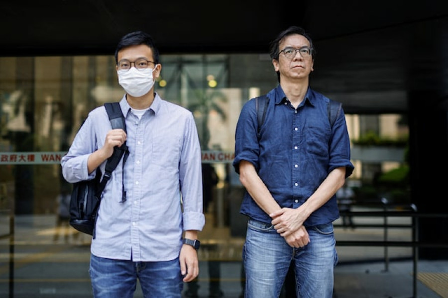 Hong Kong court expected to hand down landmark sedition verdict against two journalists