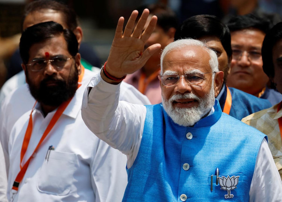 India’s Modi denies stoking divisions to win election, files nomination