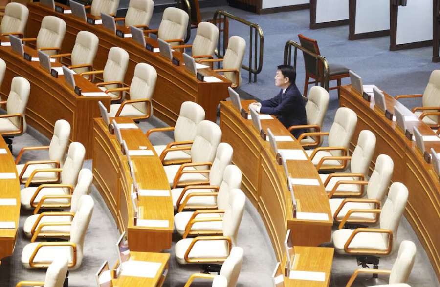 Shouting, curses as South Korean president's party boycotts martial law impeachment vote