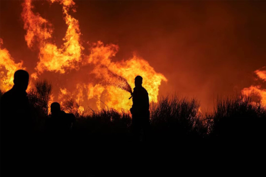 Greek wildfire spreads to edge of Athens; towns, hospitals evacuated