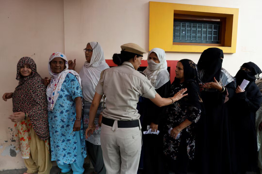 Delhi voters, scarred by Hindu-Muslim riots, want peace
