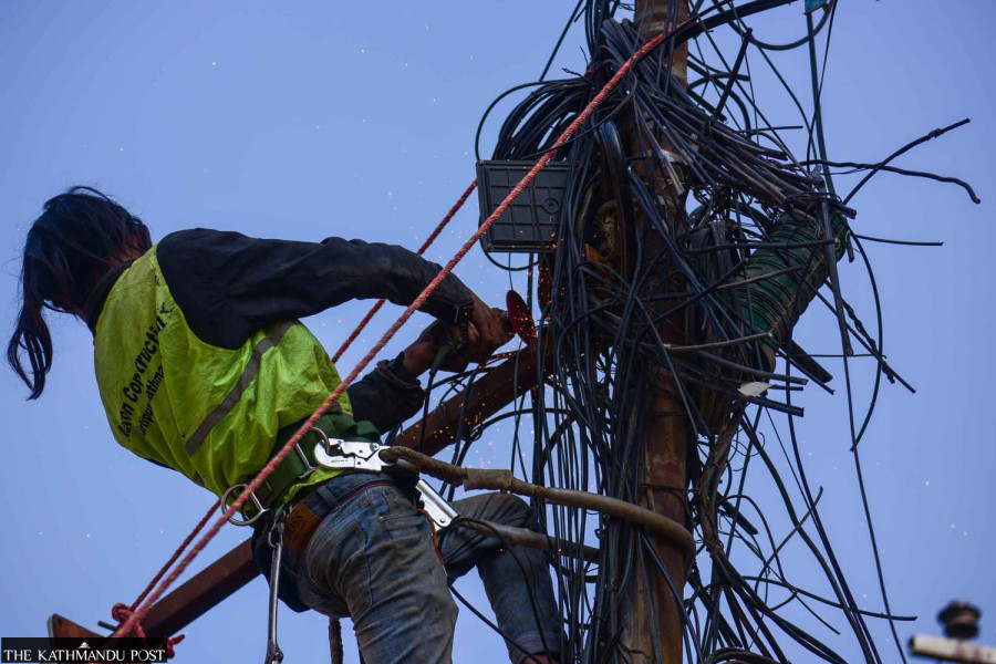 NEA seeks KMC’s help to clear internet cables from poles