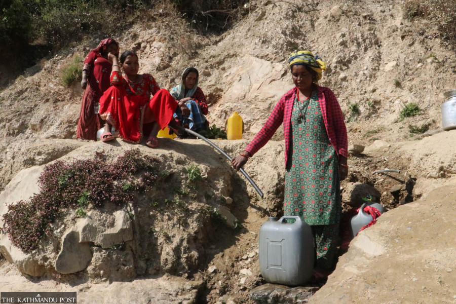Just one trickling tap for 58 households and 500 students