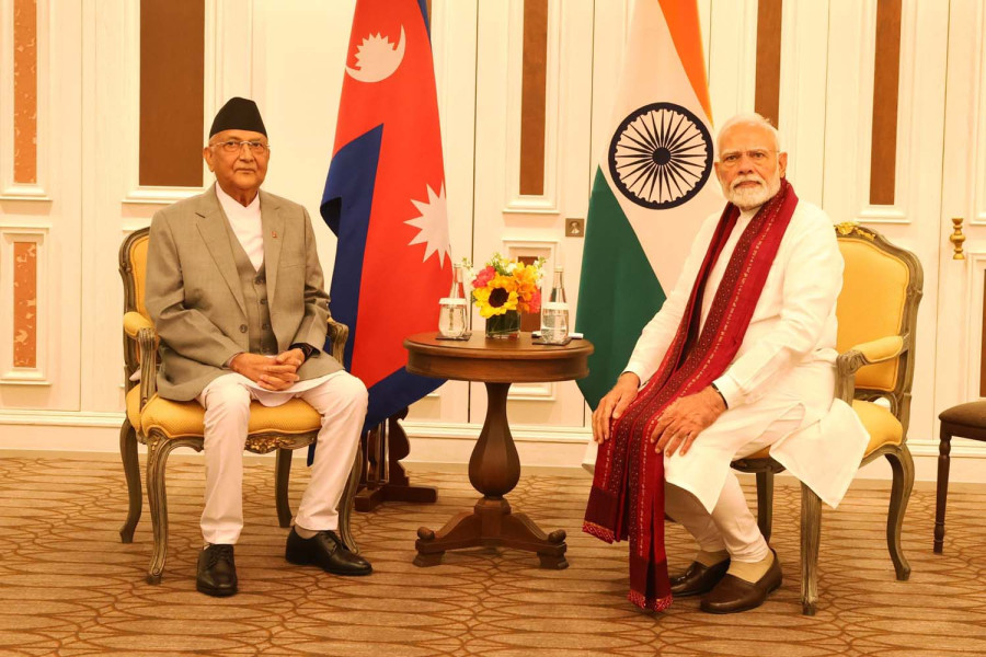 Oli, Modi break ice in Bangkok