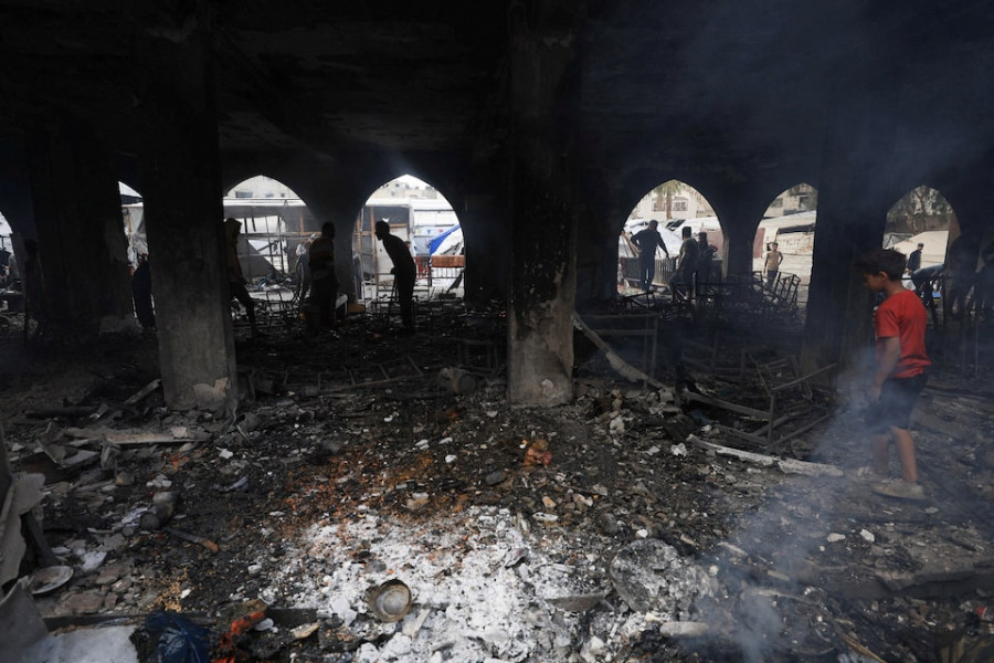 Israeli airstrikes kill 10 in school housing displaced families, hit children’s hospital, medics say