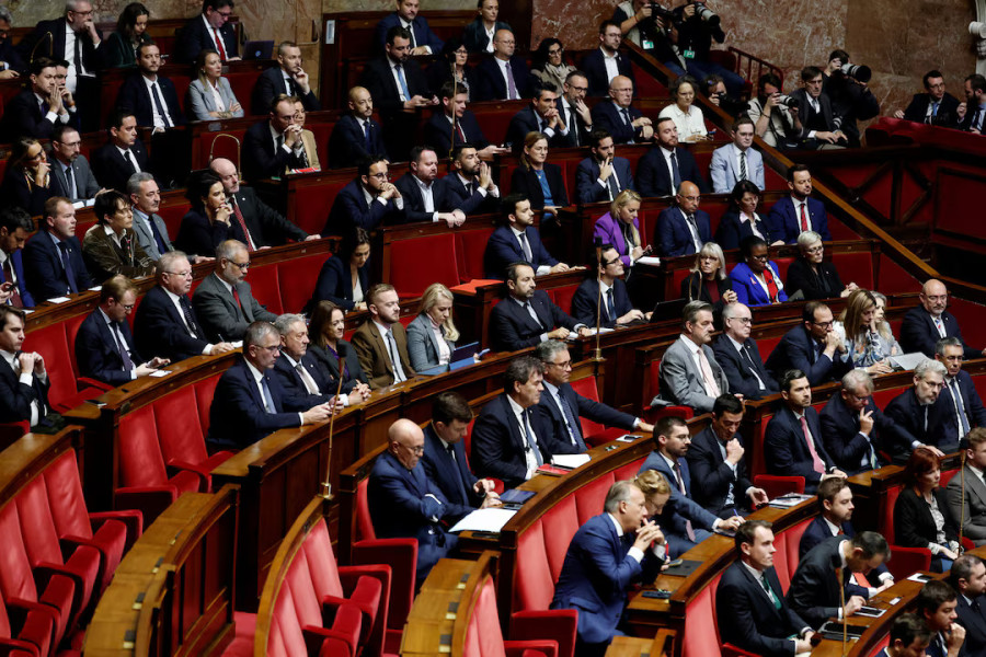French PM survives no-confidence votes after making pension concession
