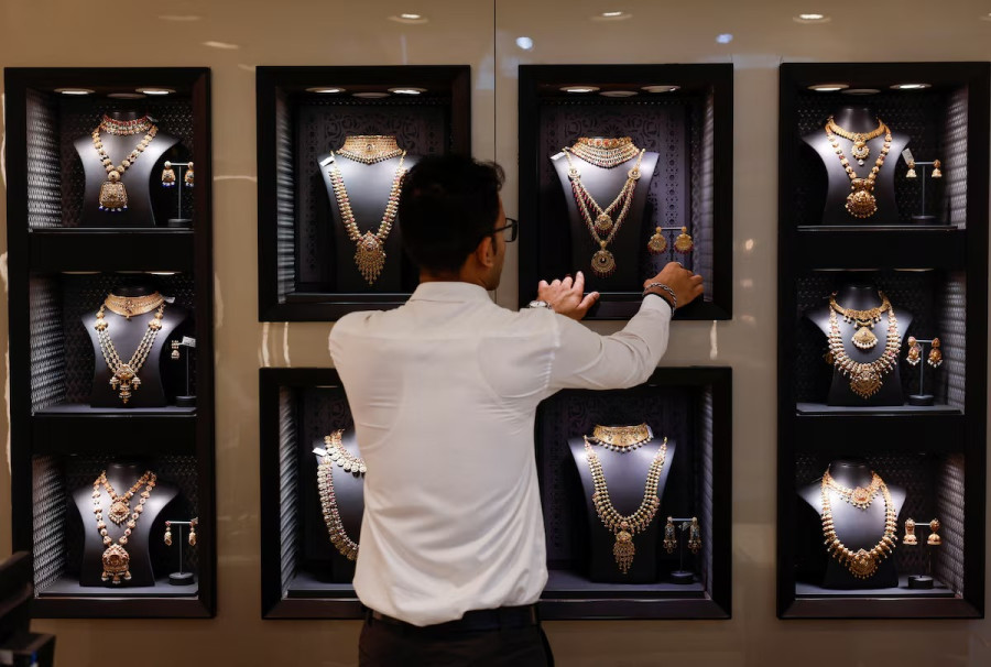 Gold retreats after record rally, on track for biggest daily drop since 2020